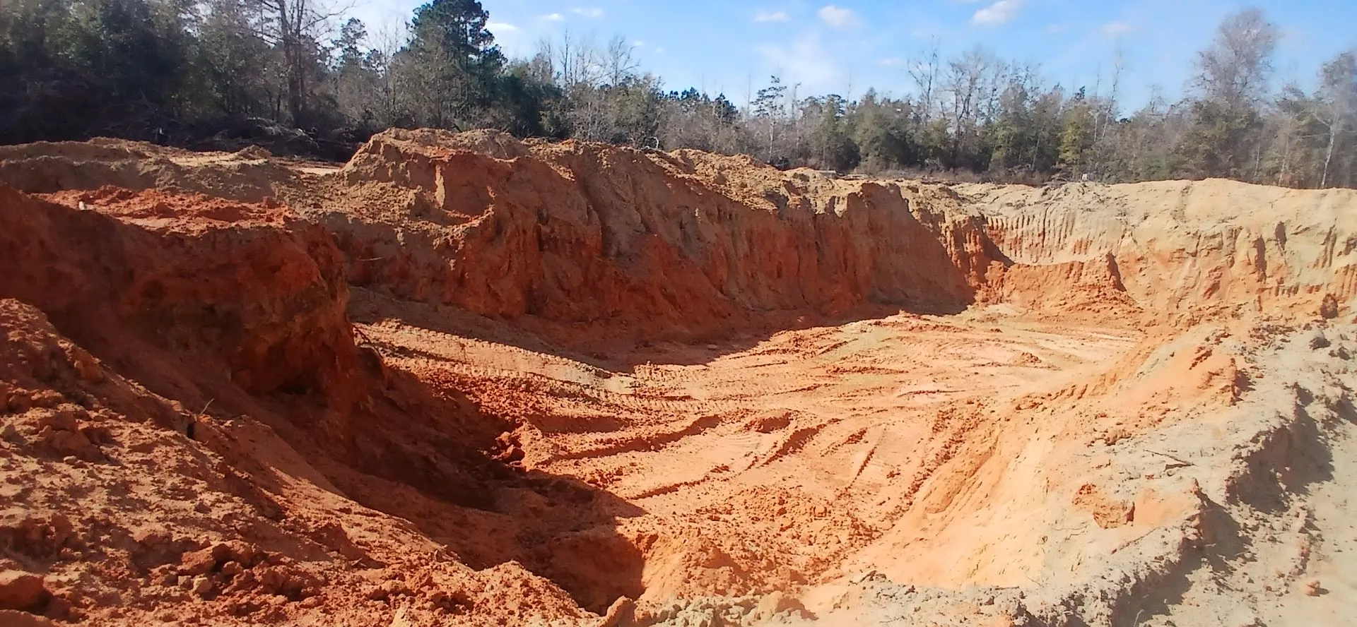 The red clay face of the Baxley pit in Jay, Florida