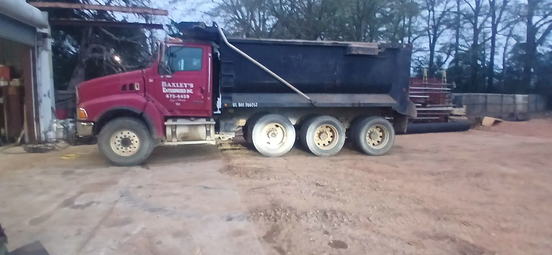 Baxley dump truck loaded at the shop door