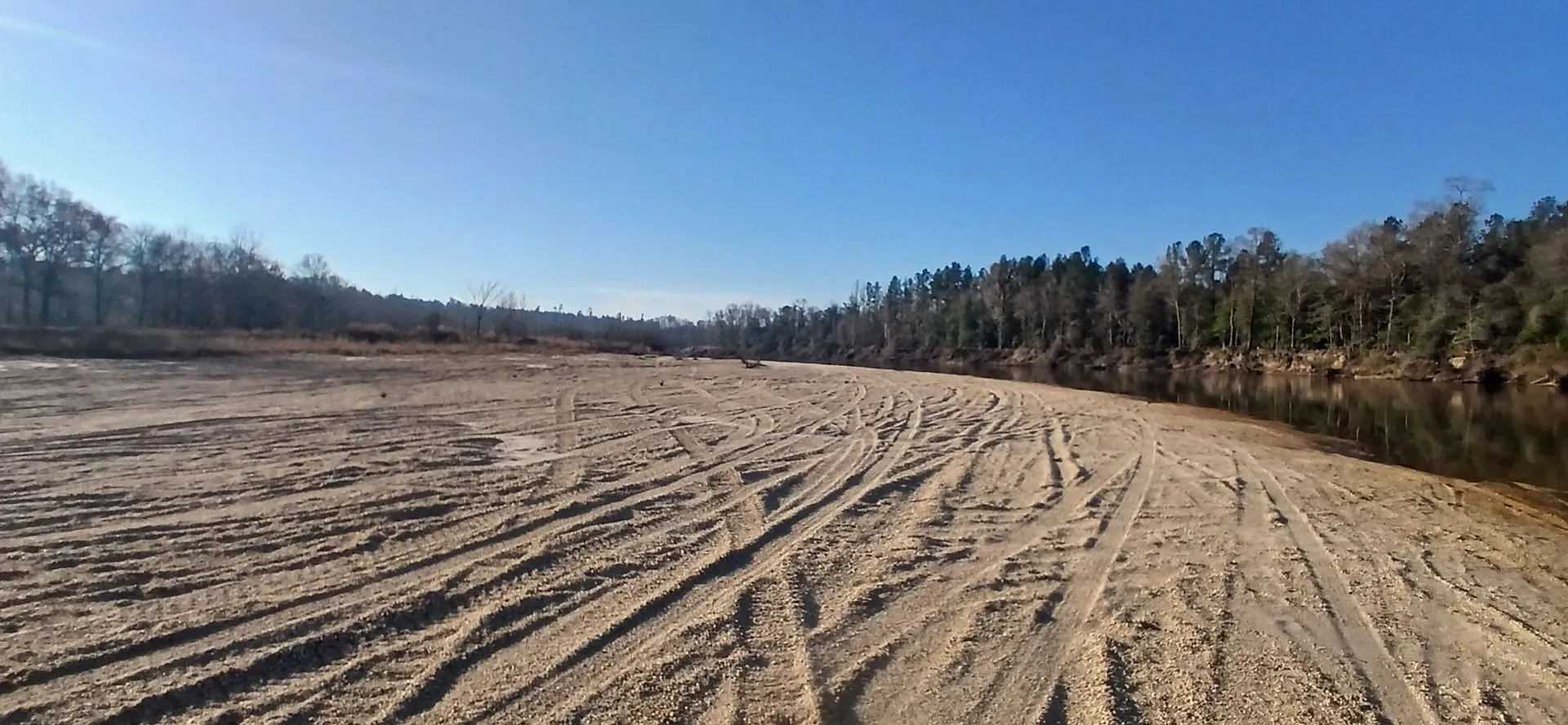Long graded flat beside the treeline